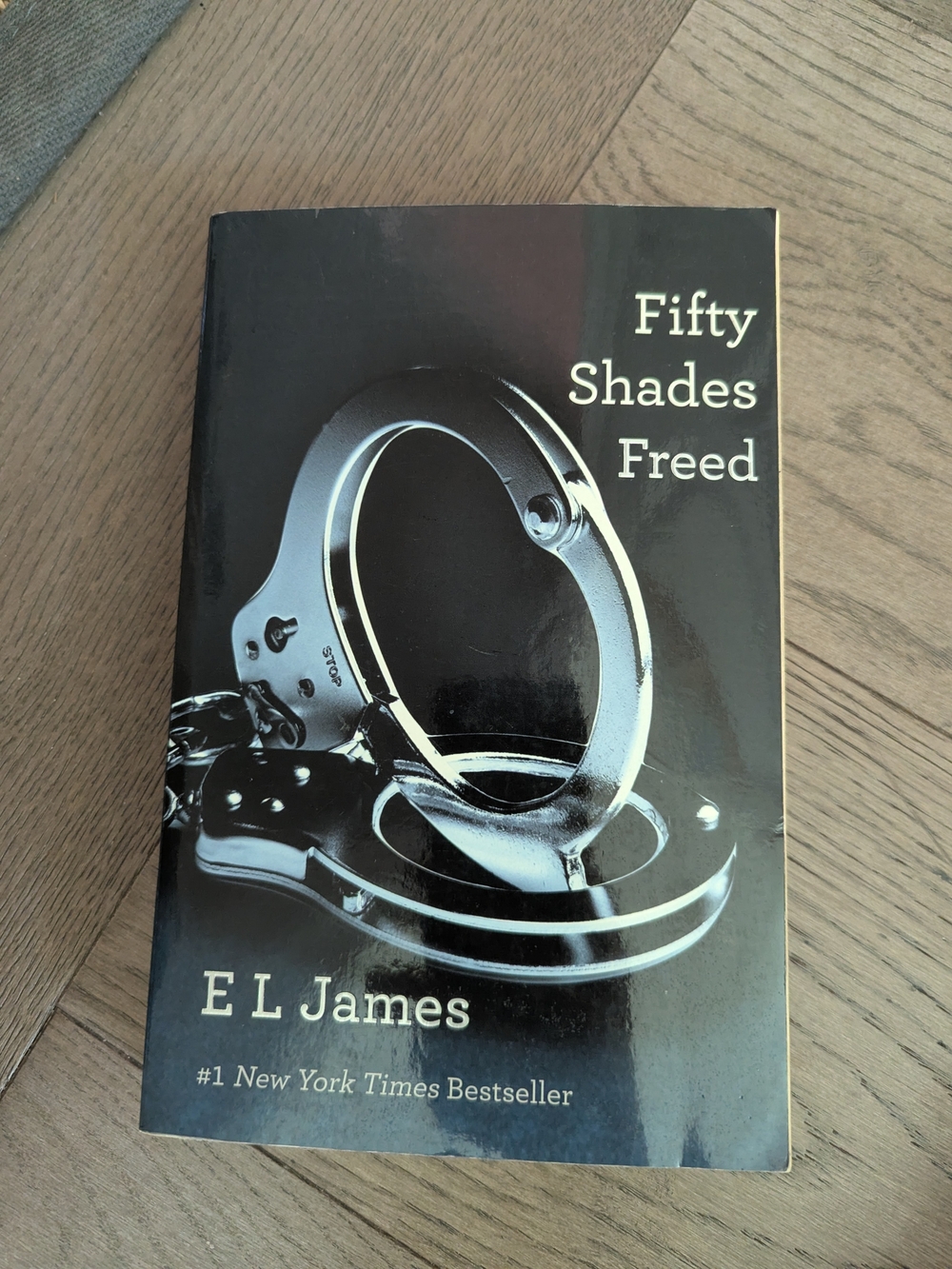 Fifty Shades Freed by - Black Paperback Romance Novel